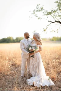 Bride wearing a classic A-line wedding dress with fitted bodice and flowing skirt