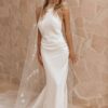 silk halter-neck wedding gown with open back and high slit