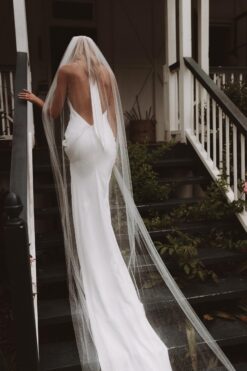 back of silk halter-neck wedding gown with train