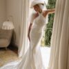 Halter satin wedding dress with open back and elegant train
