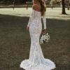 Long sleeve lace wedding dress with off-shoulder neckline and chapel train