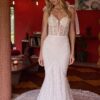 Embellished mermaid wedding gown with corset bodice and chapel train