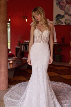Embellished mermaid wedding gown with corset bodice and chapel train