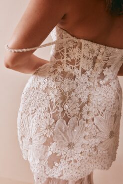 Back view of floral lace mini wedding dress