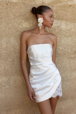 Satin mini wedding dress with strapless neckline and lace trim