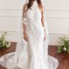 Lace backless wedding dress with chapel train on bride