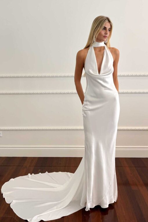Front view of satin halter wedding gown with sweep train