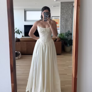 Bride wearing an elegant wedding dress in a customer review photo, 2025