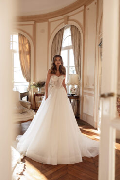 Tulle ball gown wedding dress with sheer corset bodice and 3D floral lace